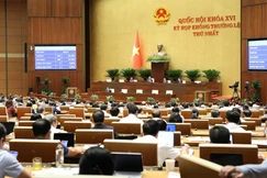 Quốc hội biểu quyết thông qua dự thảo Luật Phát triển đô thị, sáng 24-8 - Ảnh: Quang Phúc