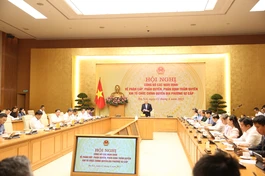 Hội nghị công bố các Nghị định về phân quyền, phân cấp; phân định thẩm quyền của chính quyền địa phương 2 cấp trong các lĩnh vực, chiều 12-6 - Ảnh: VGP/Đình Hải