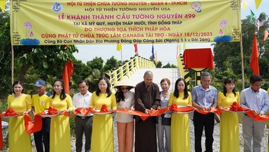 Cắt băng khánh thành cây cầu Tường Nguyên 499 - Ảnh: T.N