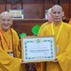 Hòa thượng Thích Thiện Thống trao Bằng tuyên dương công đức của GHPGVN đến Hòa thượng Thích Khế Chơn - Phó Chủ tịch Hội đồng Trị sự, Trưởng ban Hướng dẫn Phật tử T.Ư - Ảnh: Trung Thắng