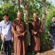 Chư Tăng và đại diện chính quyền xã Tân Nhuận Đông trồng hoa kiểng trên tuyến đường giao thông nông thôn vào khuôn viên chùa Hội Phước