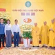 Phòng An ninh nội địa - Công an TP.HCM chụp ảnh lưu niệm với chư vị giáo phẩm lãnh đạo GHPGVN - Ảnh: Đăng Huy