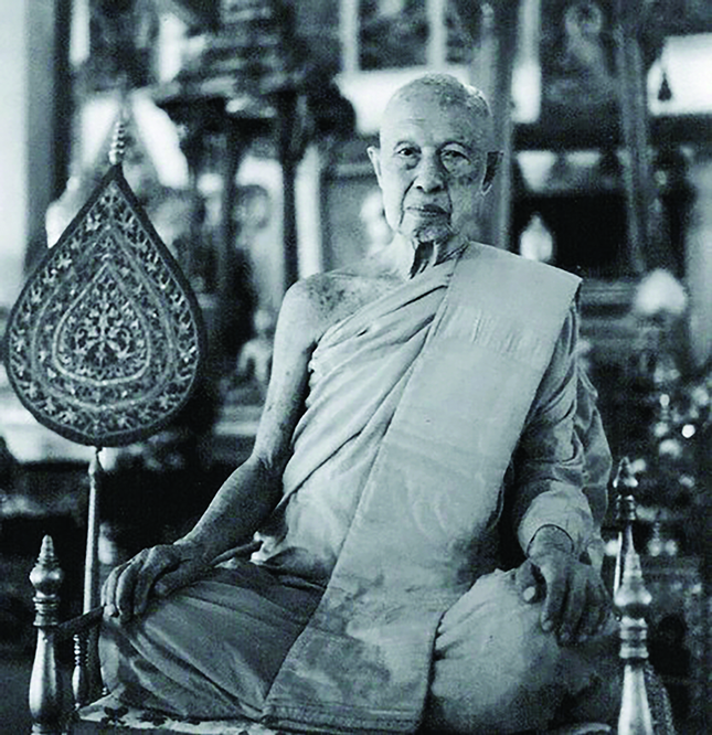 Pha Khamchan quá cố, trụ trì chính của Vat Saen Sukharam và là người sáng lập Dự án Di sản Phật giáo