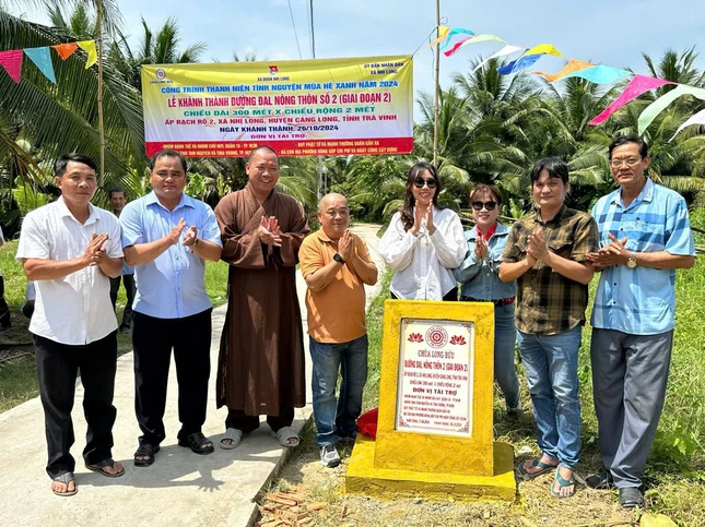 Khánh thành giai đoạn 2 đường giao thông nông thôn xã Nhị Long - Ảnh: L.B Khánh thành giai đoạn 2 đường giao thông nông thôn xã Nhị Long - Ảnh: L.B