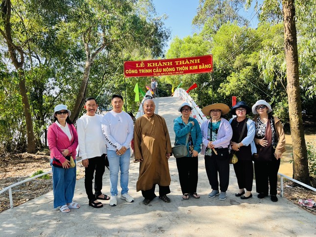 Cây cầu Kim Bằng nối liền xã Tân Lập và xã Bùi Hữu Cảnh được đưa vào sử dụng - Ảnh: T.N Cây cầu Kim Bằng nối liền xã Tân Lập và xã Bùi Hữu Cảnh được đưa vào sử dụng - Ảnh: T.N