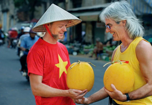 Nhiều du khách cho biết đã chọn đến Việt Nam du lịch vào dịp Tết, để tận hưởng mùa Tết ý nghĩa tại đất nước yên bình, mến khách. Ảnh trong triển lãm của nhiếp ảnh gia Trần Thế Phong