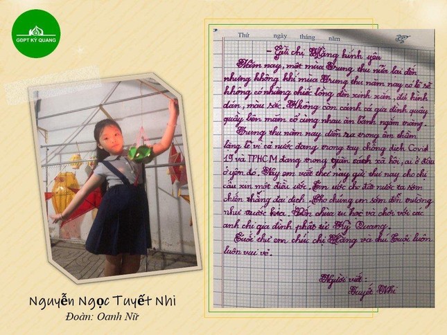 Em Nguyễn Ngọc Tuyết Nhi (đoàn sinh Oanh Vũ nữ GĐPT Kỳ Quang) viết lên những điều mong mỏi gửi về chương trình "Điều ước đêm trăng" trong dịp Trung thu do GĐPT Kỳ Quang tổ chức - Ảnh: GĐPT Kỳ Quang