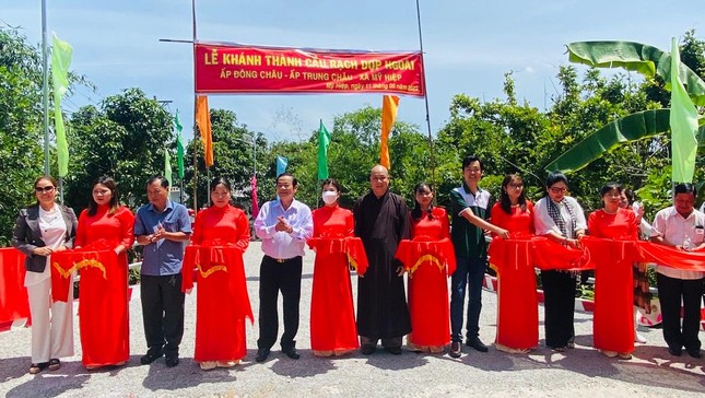 Cắt băng khánh thành cầu Rạch Dợp Ngoài