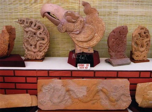 Đầu Kim Sí Điểu và hình rồng thời Trần