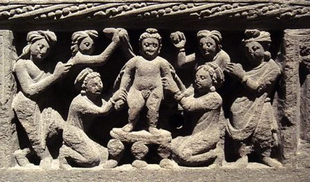 The Buddha as a child, taking a bath. Gandhara, 2nd century CE.jpg