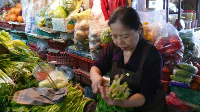 Nguoi ban rau lam tu thien.jpg