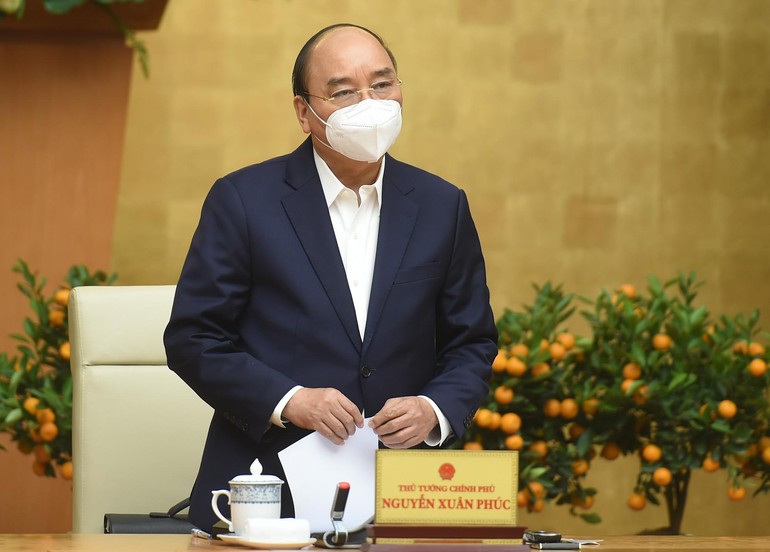 Thủ tướng Nguyễn Xuân Phúc chủ trì cuộc họp Thường trực Chính phủ về phòng chống Covid-19 - Ảnh: VGP/Quang Hiếu