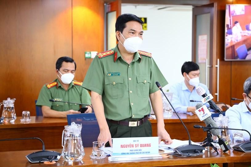 Phó Giám đốc Công an TP.HCM Nguyễn Sỹ Quang trả lời tại cuộc họp báo - Ảnh: TTBCTP.HCM