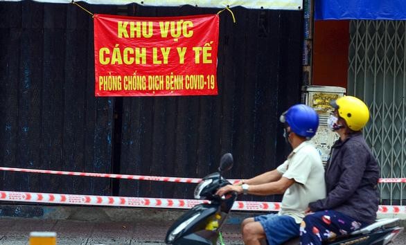 Khu vực cách ly y tế phòng chống dịch bệnh Covid-19 trên đường Đinh Tiên Hoàng, quận 1, TP.HCM - Ảnh: Quang Định Khu vực cách ly y tế phòng chống dịch bệnh Covid-19 trên đường Đinh Tiên Hoàng, quận 1, TP.HCM - Ảnh: Quang Định