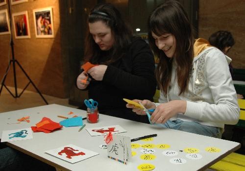 Bulgarian children make Chinese Luna New Year cards in Sofia, capital of Bulgaria, Feb. 11, 2010, during a salon to celebrate the upcoming Chinese Lunar New Year which falls on Feb. 14 this year. (Xinhua/Pu Haiyan)